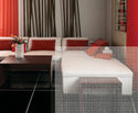 A modern living room scene featuring a white sectional sofa with red and orange accent pillows, a dark wood coffee table, and bold red curtains in the background.